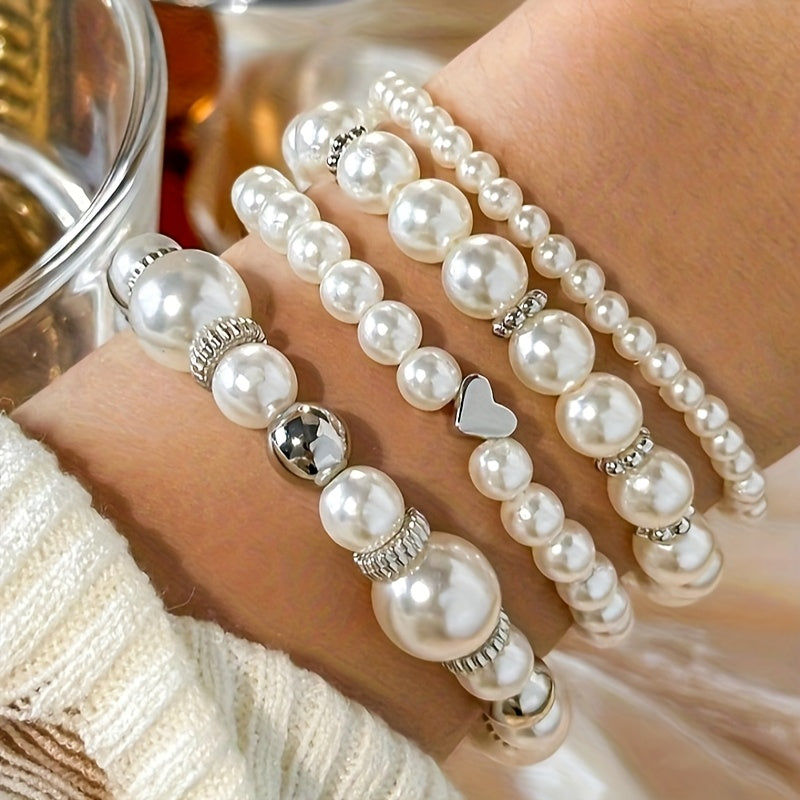 Set di bracciali eleganti con perle e cuore