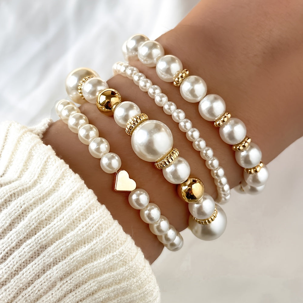 Set di bracciali eleganti con perle e cuore