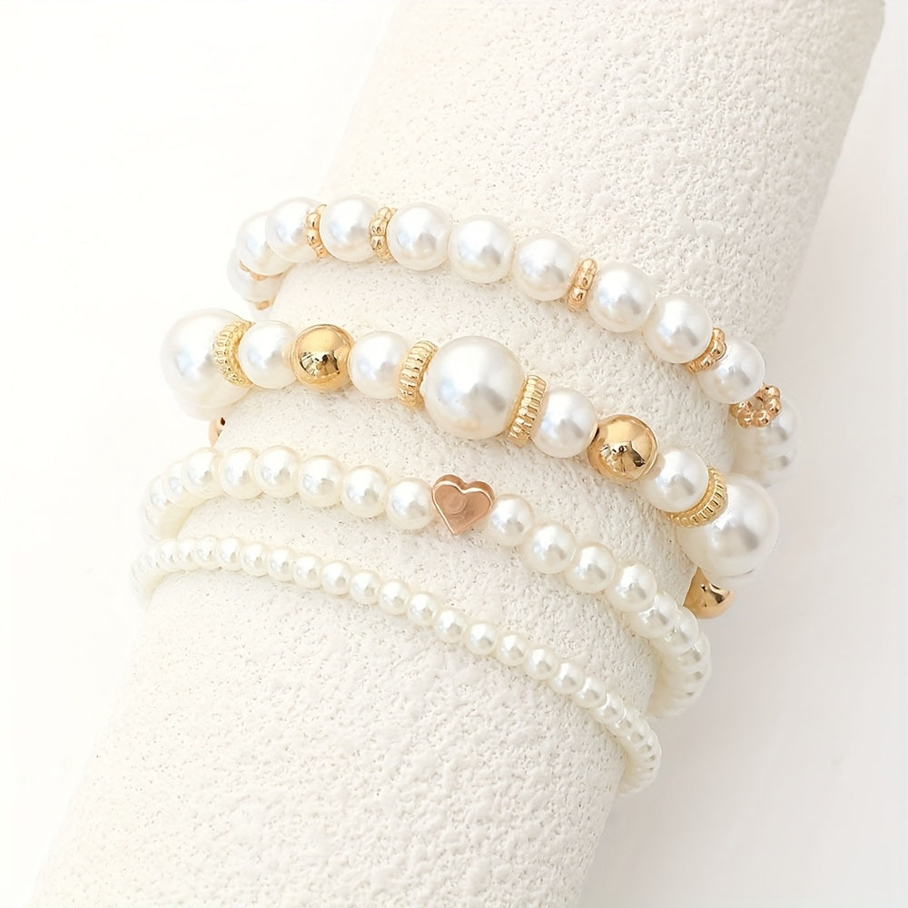 Set di bracciali eleganti con perle e cuore