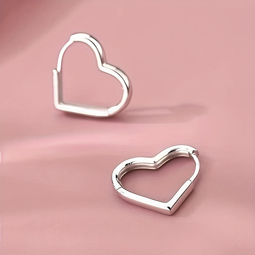 Orecchini in acciaio inox a cuore dorato