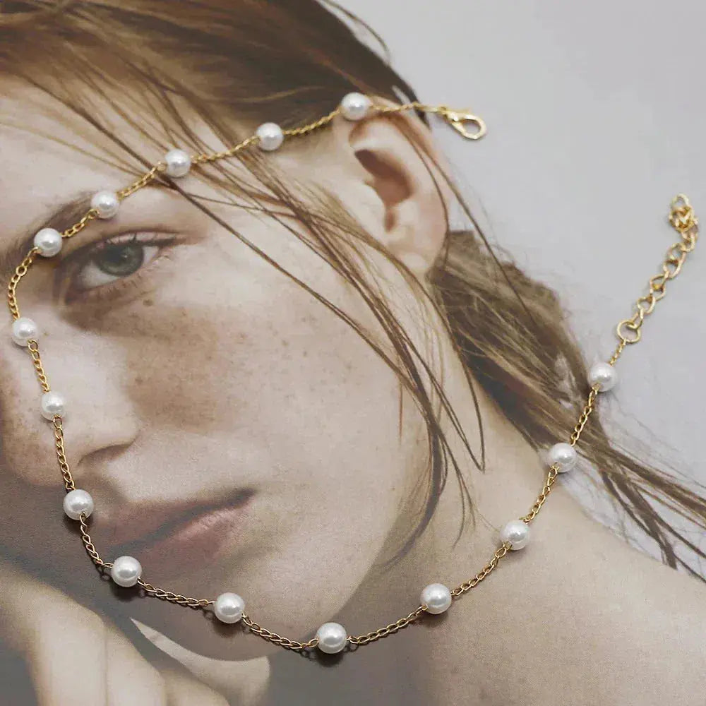 Collana elegante in oro con perle