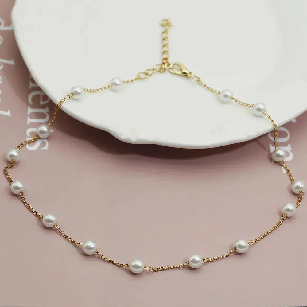 Collana elegante in oro con perle