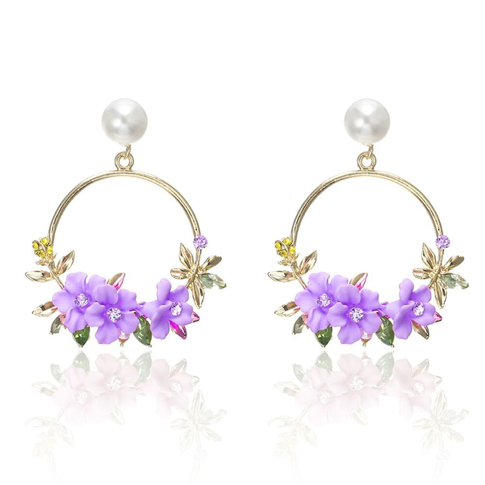 Orecchini eleganti in oro con fiore e perla