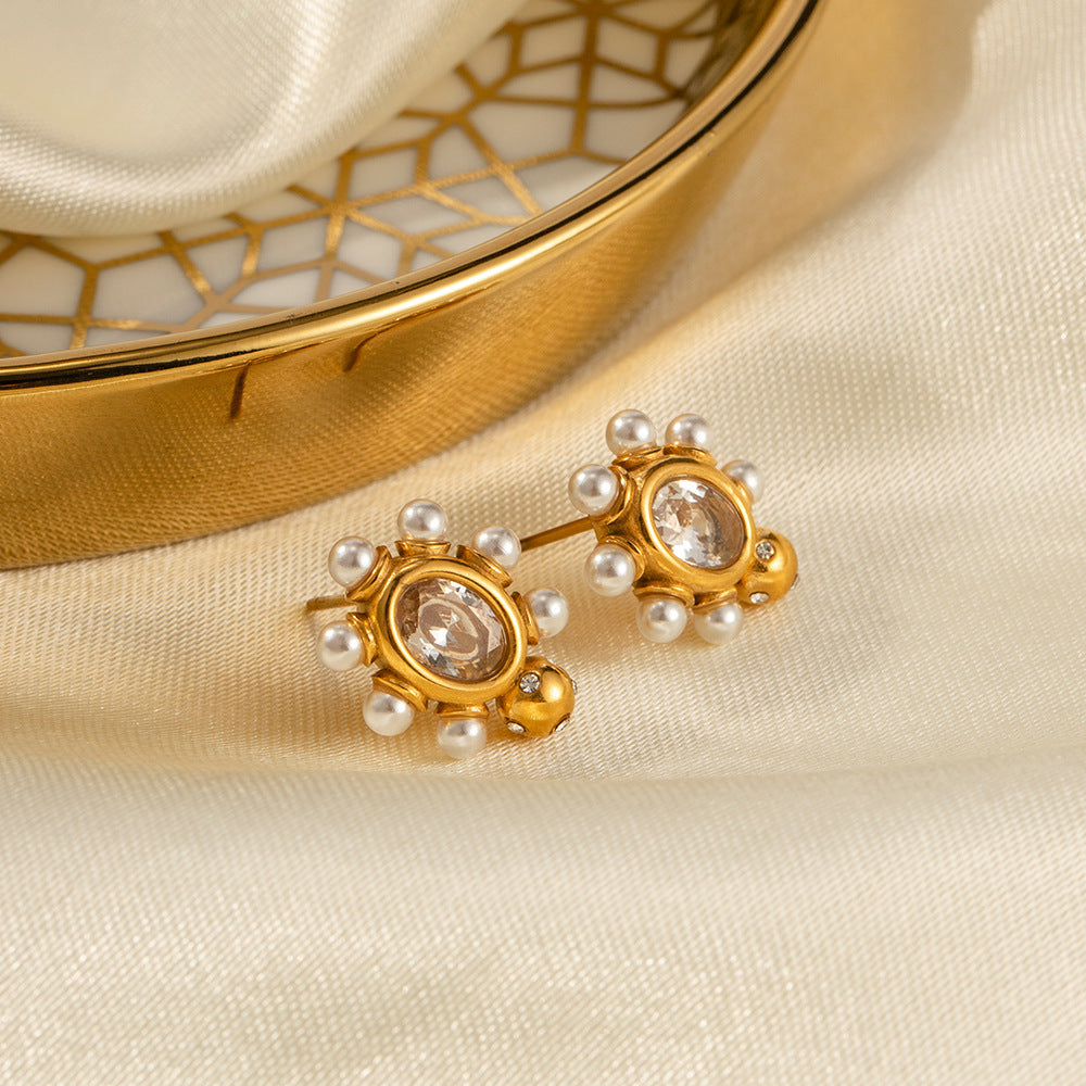 Orecchini sofisticati in oro con perla