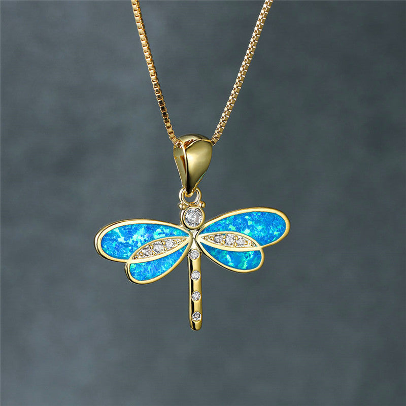Collana con ciondolo a libellula in oro con dettaglio in opale