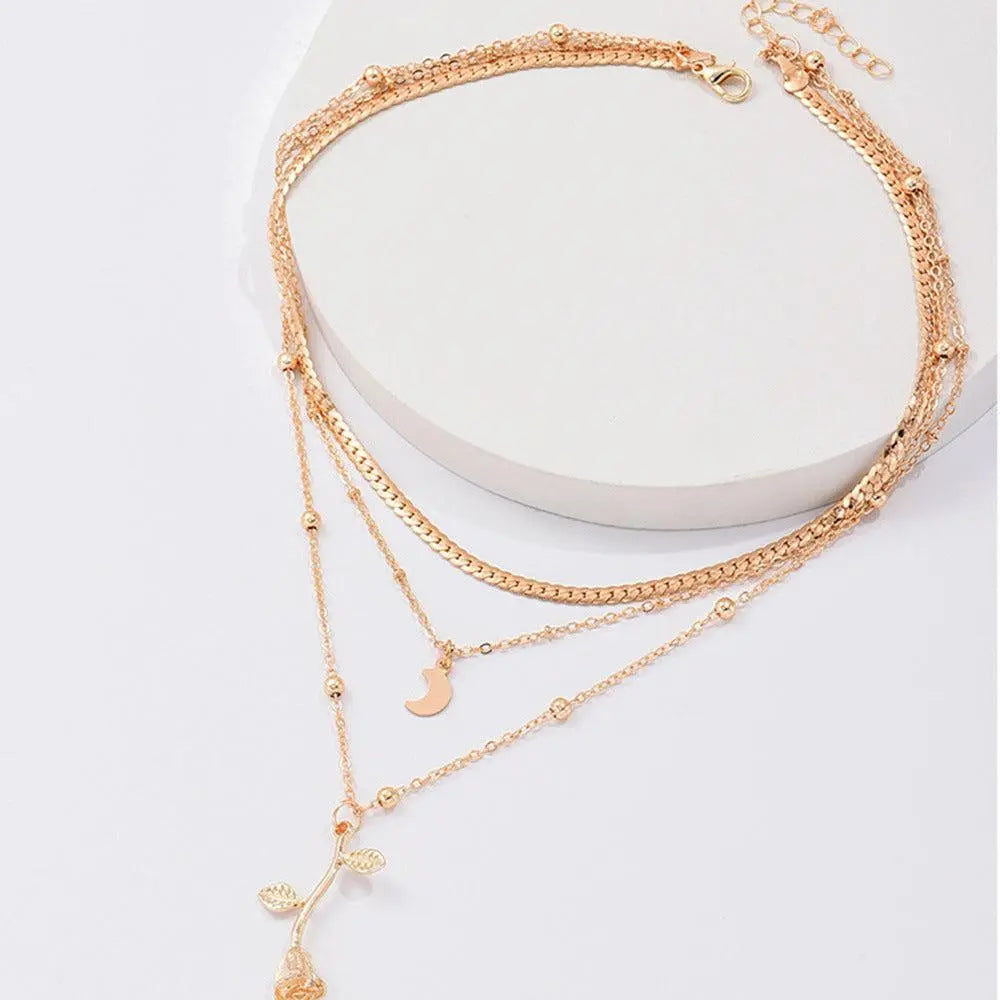 Set di collane con ciondolo a rosa dorata