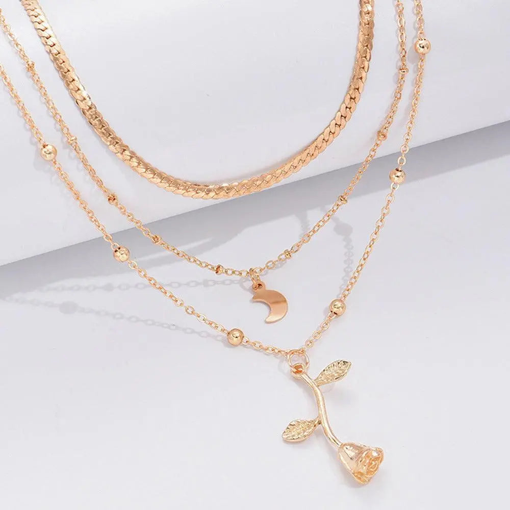 Set di collane con ciondolo a rosa dorata