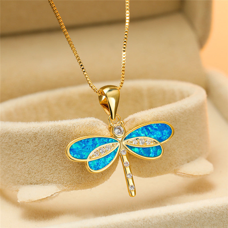 Collana con ciondolo a libellula in oro con dettaglio in opale