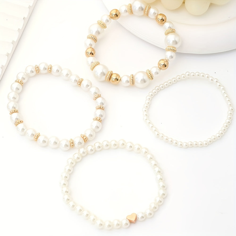 Set di bracciali eleganti con perle e cuore