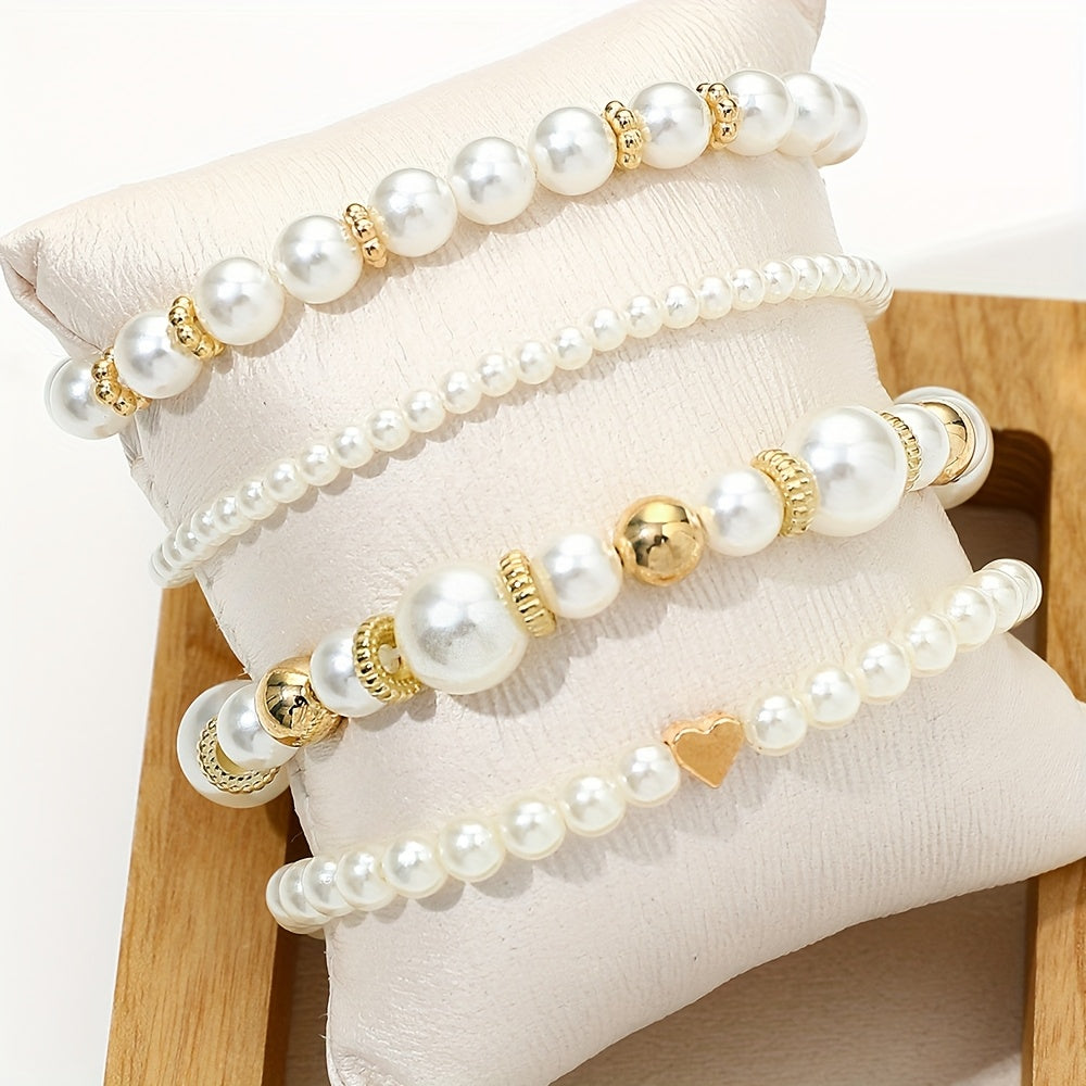 Set di bracciali eleganti con perle e cuore
