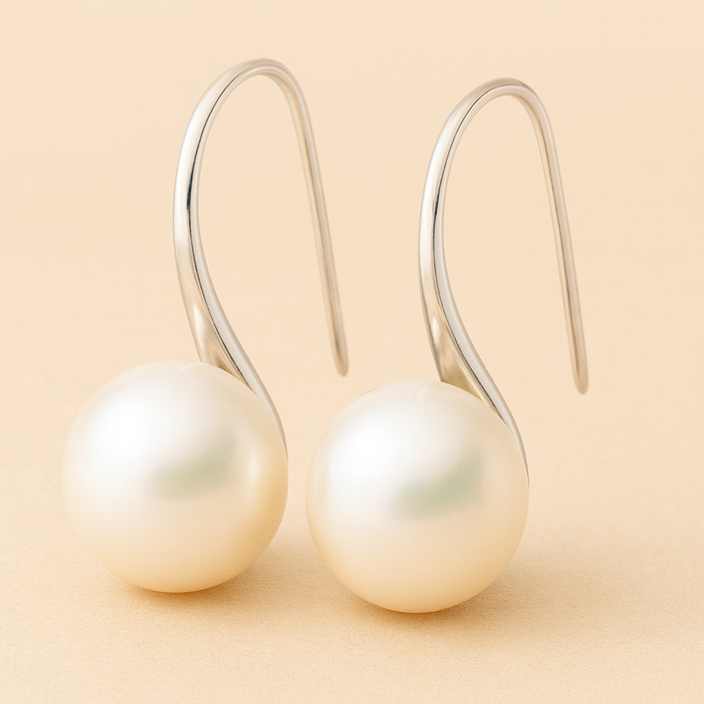 Orecchini eleganti pendenti con perle