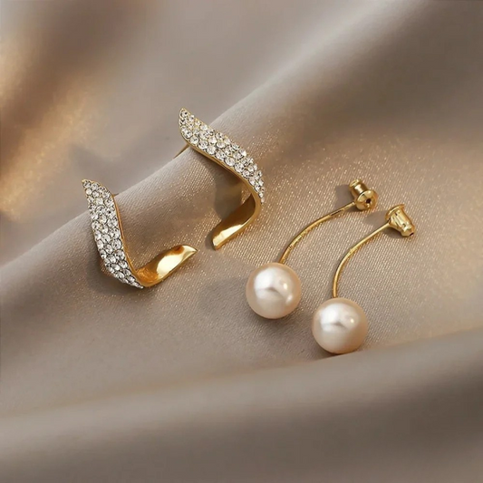 Orecchini pendenti chic in oro con perla