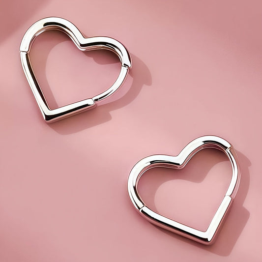 Orecchini in acciaio inox a cuore dorato