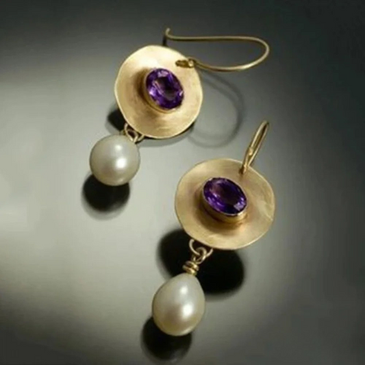 Orecchini in oro con perla e zirconi viola