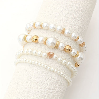 Set di bracciali eleganti con perle e cuore