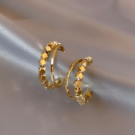 Orecchini eleganti placcati oro cubici