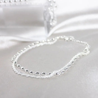 Bracciale elegante in argento con pietre di zirconia