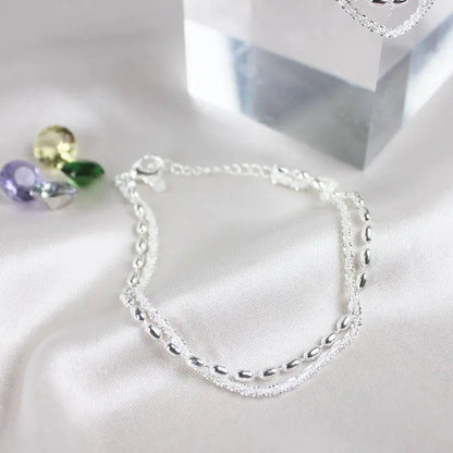 Bracciale elegante in argento con pietre di zirconia