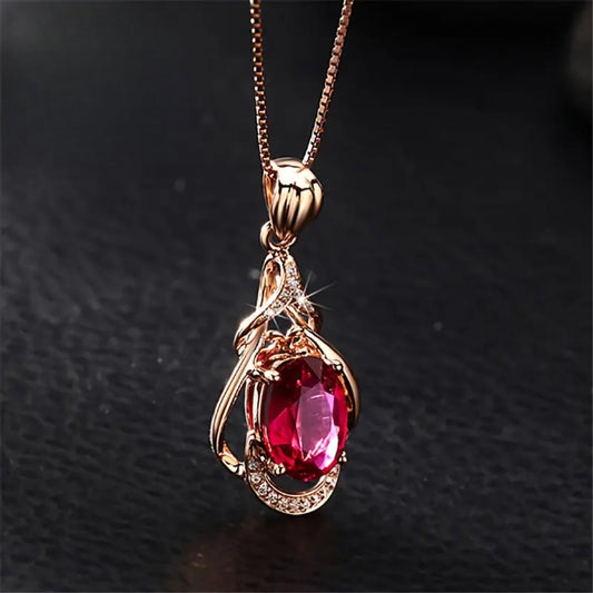 Collana elegante con cristalli rossi e dorati