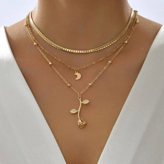 Set di collane con ciondolo a rosa dorata