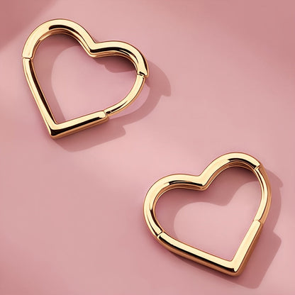 Orecchini in acciaio inox a cuore dorato