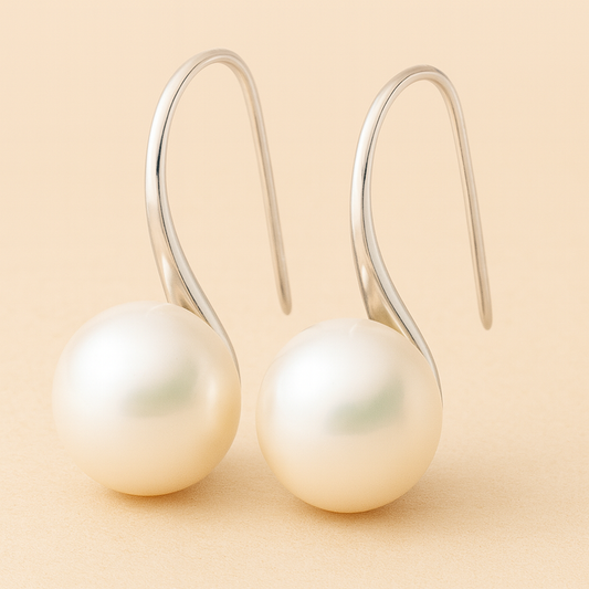 Orecchini eleganti pendenti con perle