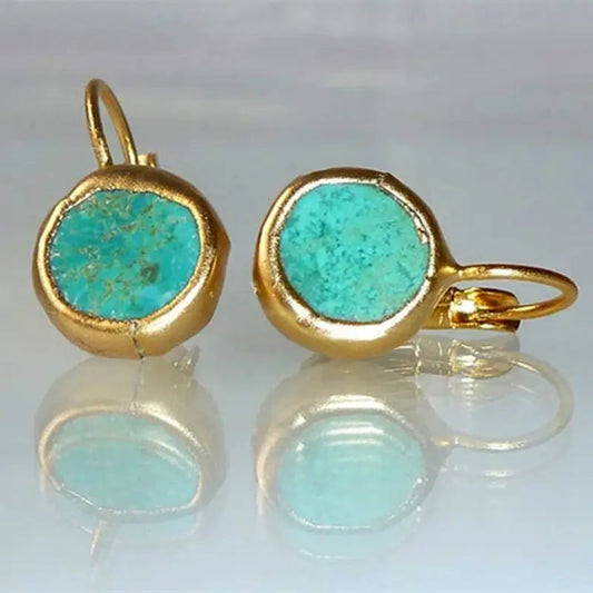 Orecchini eleganti in oro con gemma turchese