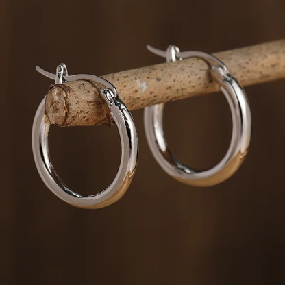 Orecchini a cerchio vintage in oro e argento
