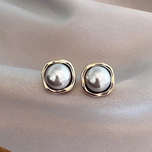 Orecchini Sofisticati con Perla Nera